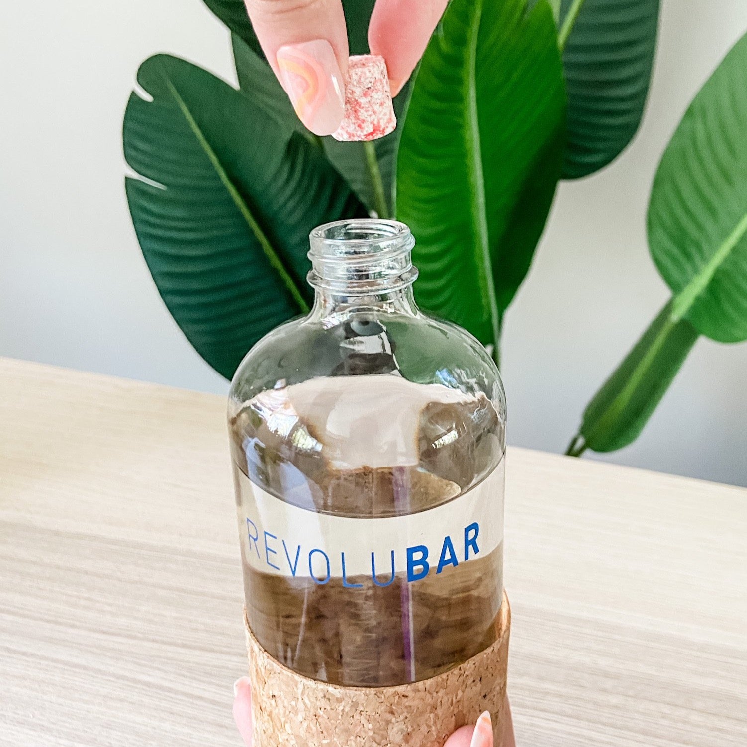 revolubar glass bottle with revolubar all purpose cleaner